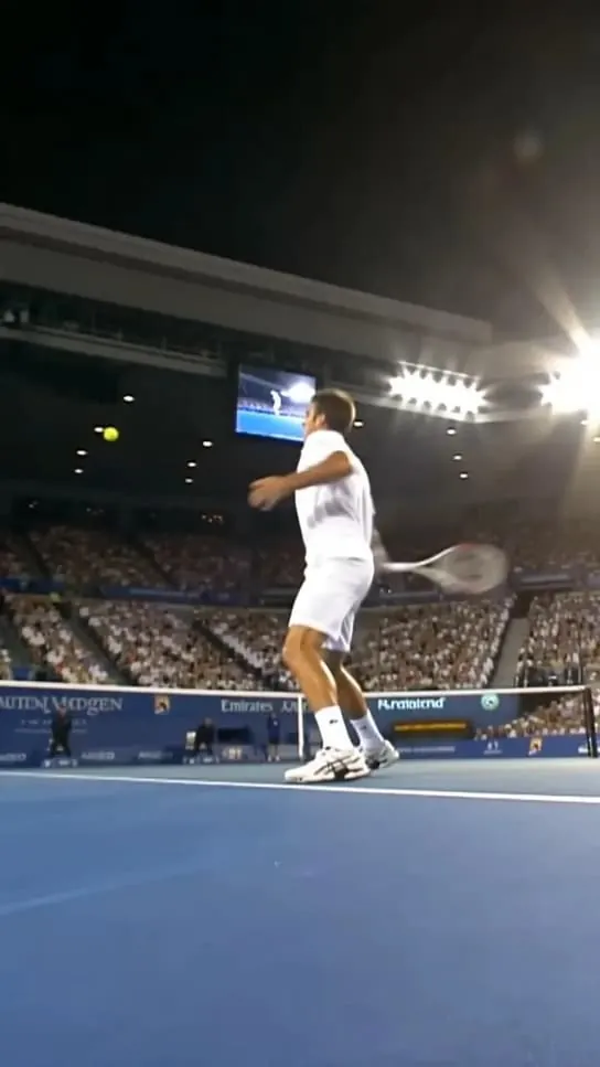 DER V2 sample: tennis player serving at night